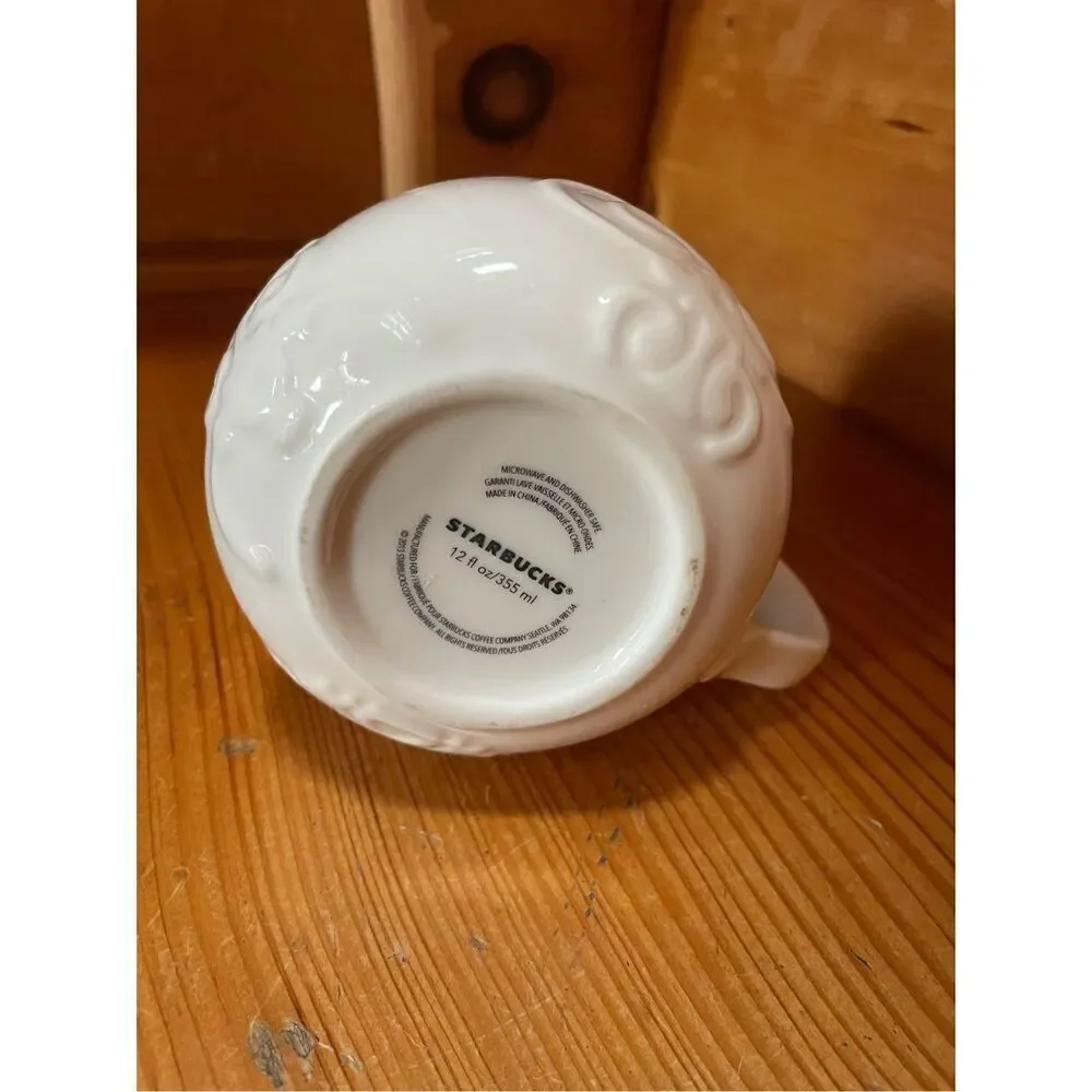 Starbucks 2013 Casi Cielo White Embossed Floral Bronze Coffee Cup Mug